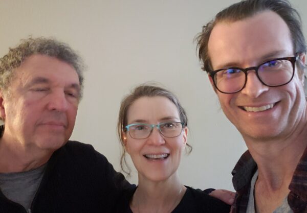 Care Teams’ member Charles with Barbara and Drew during a relaxed movie night visit 
