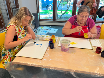 People painting watercolors